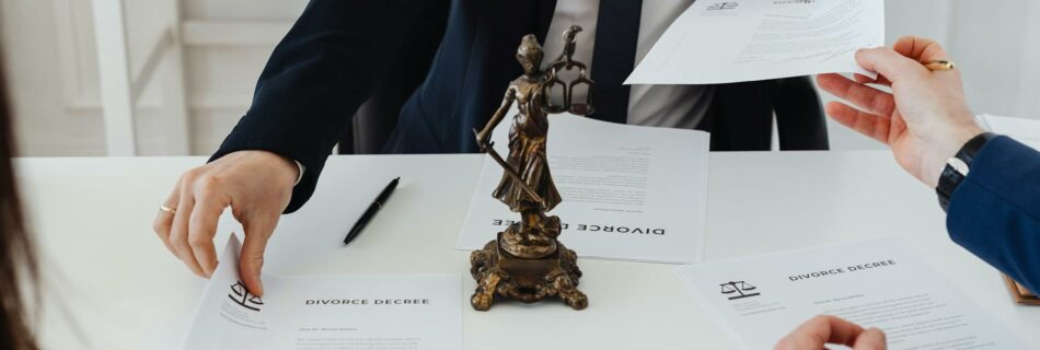 people holding divorce papers